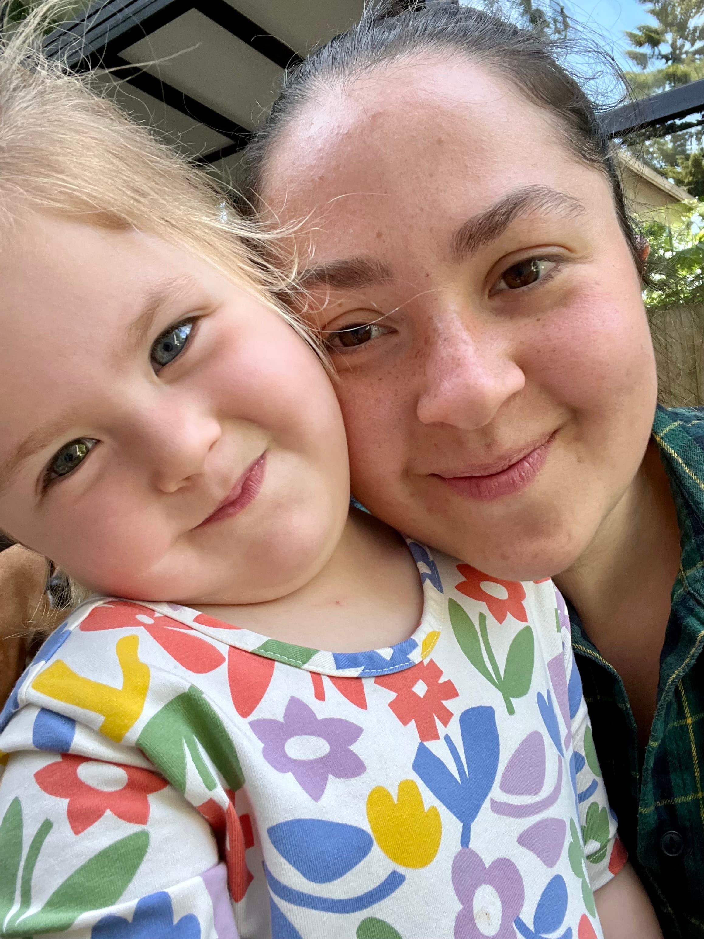 Liza and her daughter Himalaya smiling together outdoors